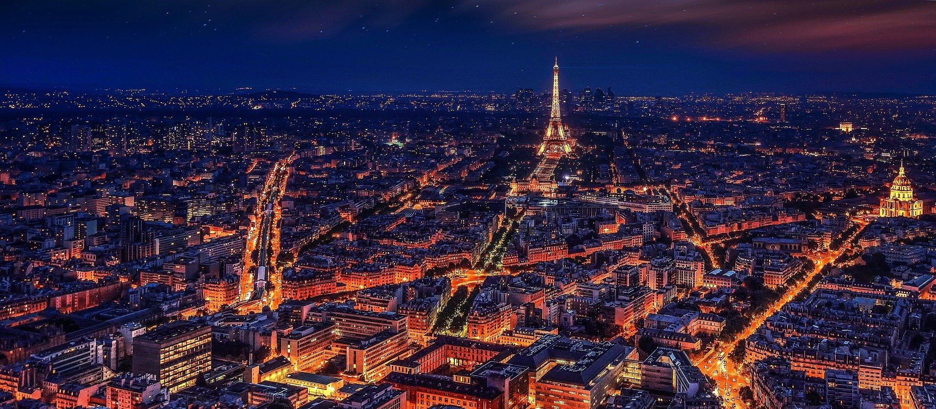 Paris cityscape with Eiffel Tower at night.